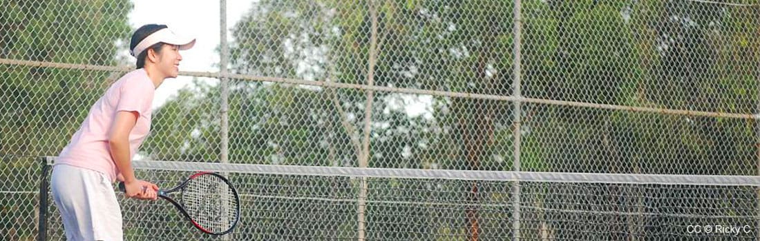 Woman playing tennis.